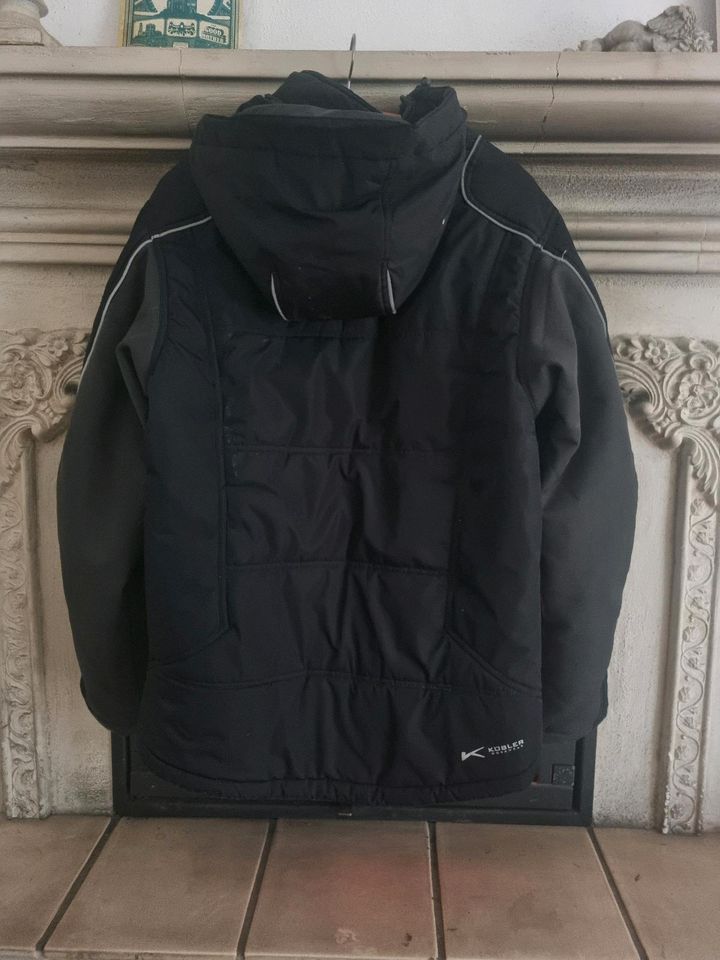 Jacke Kapuze warm Kübler M schwarz Herren Damen Unisex wasserabw. in Bad Arolsen