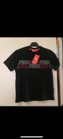 PUMA T-Shirt schwarz Gr. 140 mit rot/weißer Schrift NEU Nordrhein-Westfalen - Bergisch Gladbach Vorschau