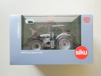 Siku Farmer - Deutz Agrotron 265, silber OVP 1:32 Köln - Mülheim Vorschau