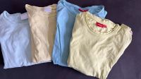 4 T-Shirts Manguun 146-164 blau gelb Nordrhein-Westfalen - Langerwehe Vorschau