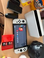 Nintendo Switch Oled schwarz weiß mit 2 Spielen Saarland - Friedrichsthal Vorschau