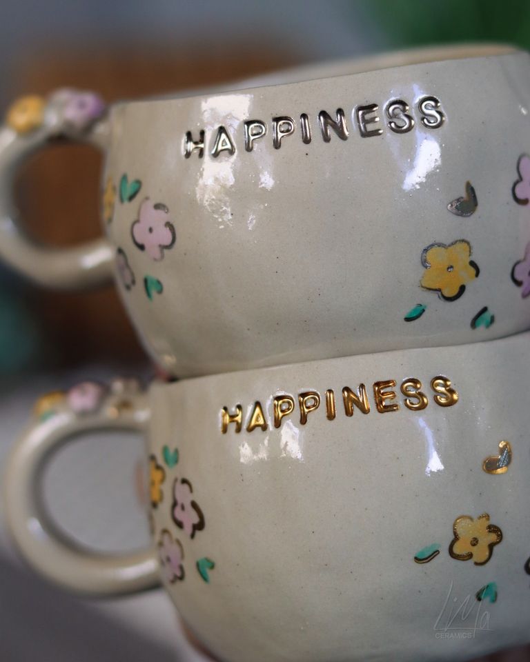 Handgetöpferte Tassen „happiness“ in Düren