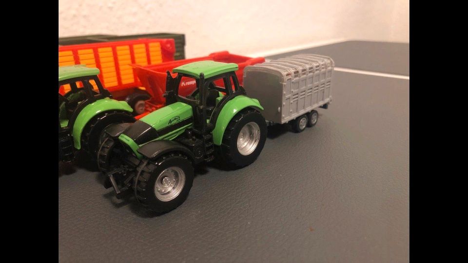 Siku Landtechnik-Konvolut (Deutz, Claas, John Deere,…) 1:87 in Celle