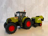 siku Claas Axion 850 + Rollant 340 1:32 Schleswig-Holstein - Gülzow Vorschau