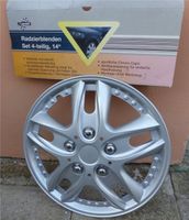 NEU !  1 Radkappe Radzierblende, 14",silberfarben,UNBENUTZT Hessen - Florstadt Vorschau