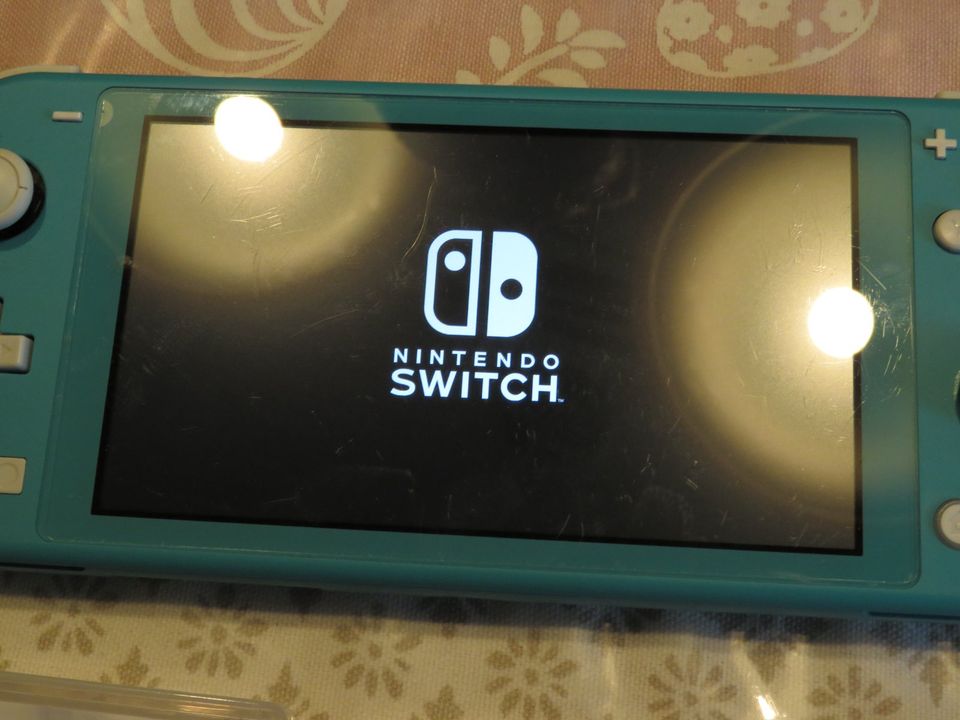 Nintendo Switch Lite türkis mit 3 Spielen und Schutzcase mit OVP in Rehden