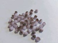 7 Tüten Swarovski ® Kristalle 4mm Doppelkegel rosa glitzer/grau Niedersachsen - Bockenem Vorschau