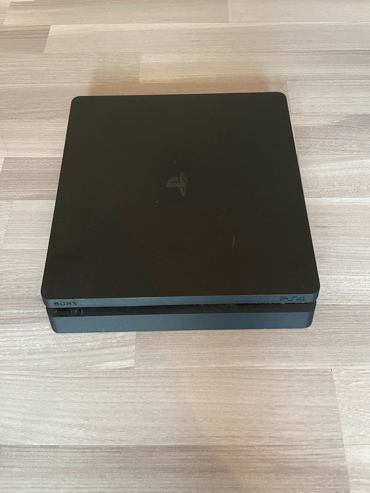 Sony PlayStation 4 Slim 1TB + Spiele in Versmold