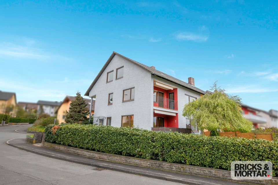 Geräumige Doppelhaushälfte mit schönem Garten und Carport in Kleinrinderfeld