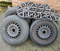 Winterreifen 195/65 R15 auf Opel Stahlfelge+traumhafter Radkappen Nordrhein-Westfalen - Versmold Vorschau