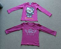 2 Longsleeves / Langarmshirts Gr. 128 Hello Kitty Hessen - Gudensberg Vorschau