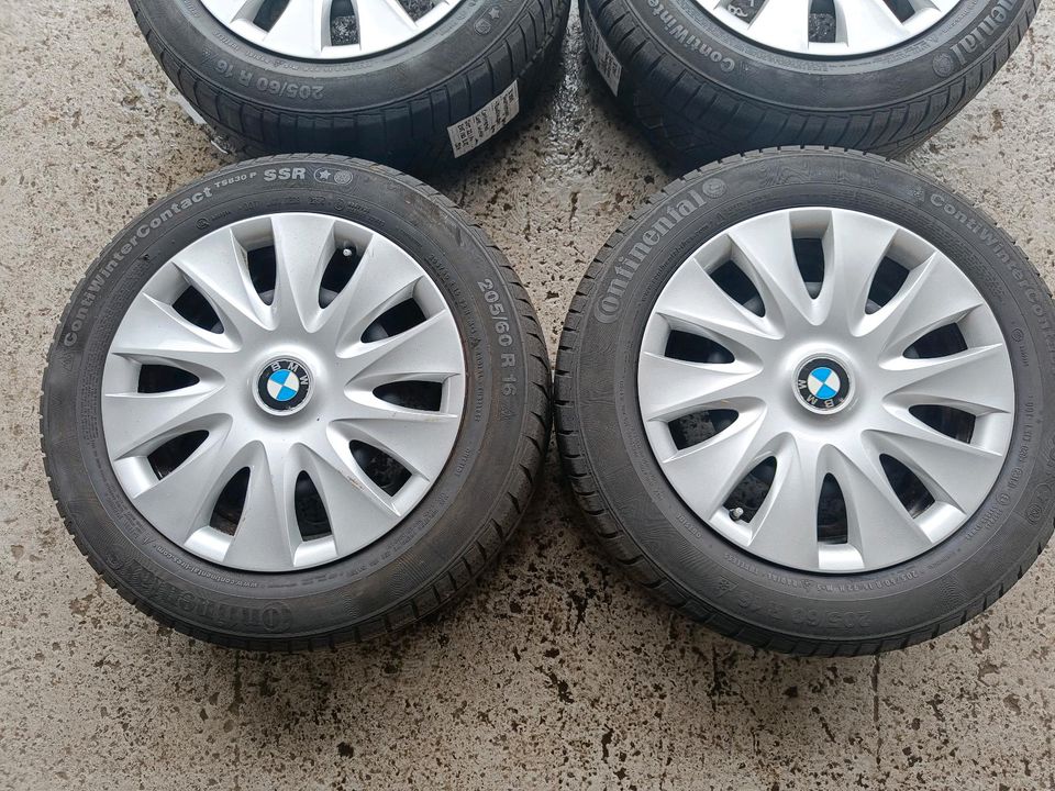 Winterradsatz Stahlfelgen BMW Radkappen Continental 205/60 R16 in Saarlouis