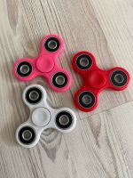 Fidget Spinner Spielzeug Kinder bunt rot Nordrhein-Westfalen - Nörvenich Vorschau