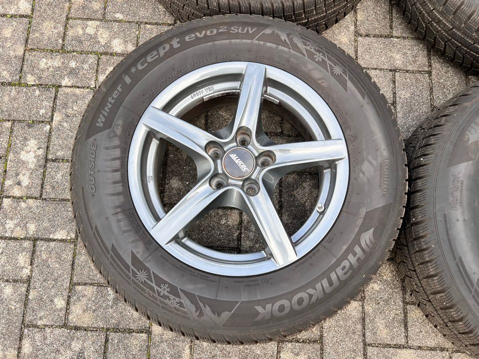 215 70 R16 100T Hankook Winter 6,5Jx16 ET39 LK5x114,3 ALUTEC 7mm in Husum