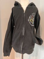 Harry Potter kapuzenjacke hoodie Jacke grau/schwarz  140/146 Frankfurt am Main - Seckbach Vorschau