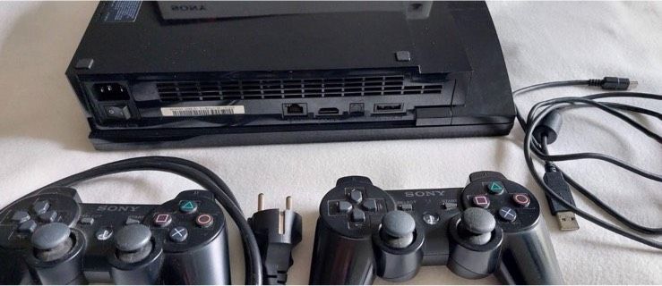 PlayStation 3 inklusive 2 Controller & 2 Spiele-defekt an Bastler in Dortmund
