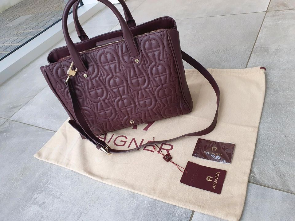 Aigner Tasche burgundy NEUWERTIG in Lübbecke 