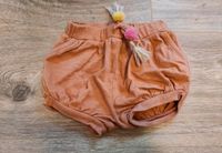 Mädchen Shorts kurze Hose cognac neon Bommel Pompoms 74 80 pink Nordrhein-Westfalen - Alsdorf Vorschau