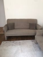 Sofa in Grau mit Kissen Nordrhein-Westfalen - Lübbecke  Vorschau