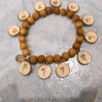 Armband Holz mit Elfen Handmade  11 kleine Anhänger mit Elfenbild Bayern - Erlangen Vorschau