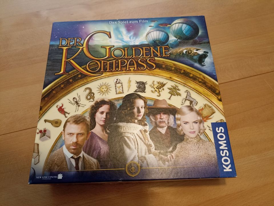 Spiel "Der Goldene Kompass" von KOSMOS w/ NEU in Nidderau