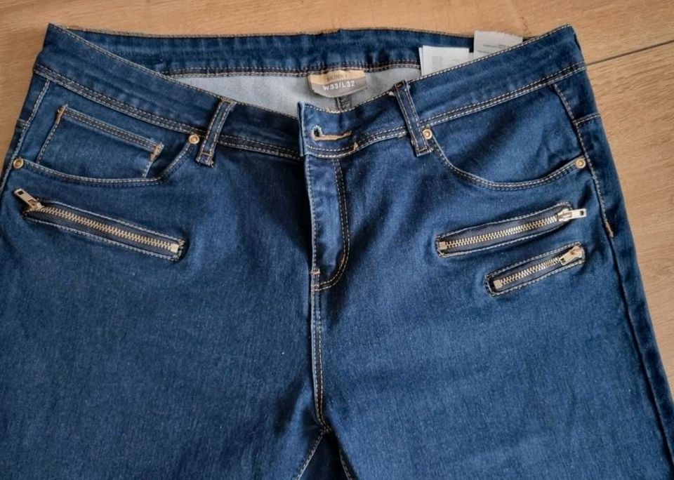 Dunkelblaue Skinny Jeans mit coolen Reißverschlüssen W33 L32 in Ditzingen