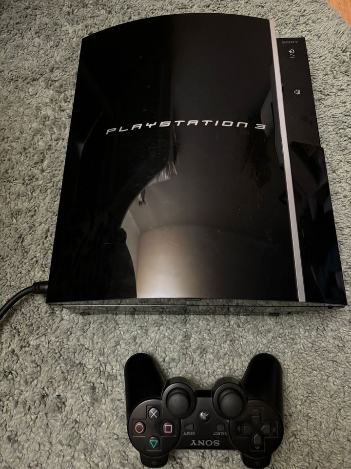 PlayStation 3 mit einem Controller in Düsseldorf