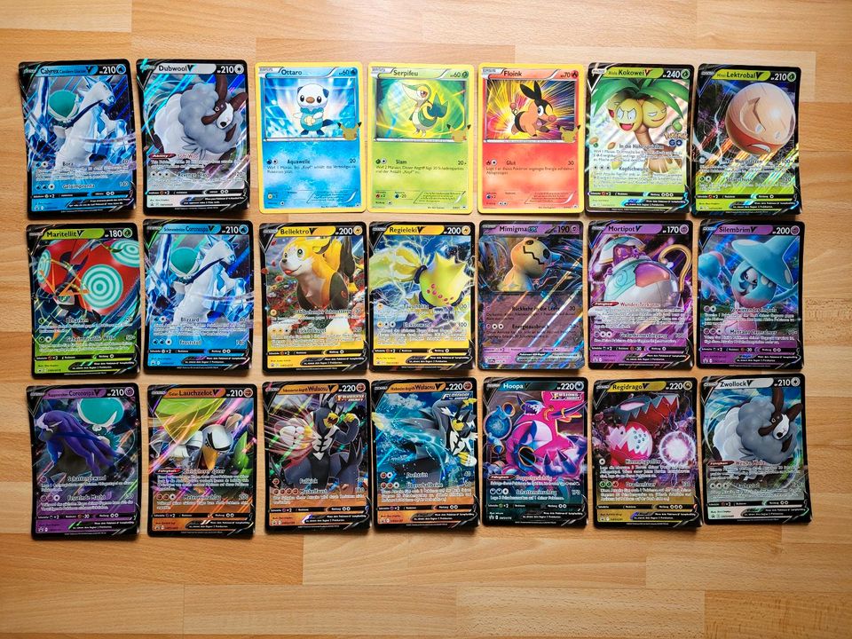 100 Pokemon Karten deutsch boosterfrisch + V ex Booster Holo Tin in Berlin