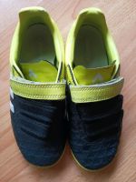 Schwarz-gelbe Adidas Hallenschuhe Gr. 33 Niedersachsen - Göttingen Vorschau