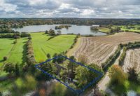 Zwei Häuser auf einem Grundstück mit Seeblick in Feldrandlage Schleswig-Holstein - Molfsee Vorschau