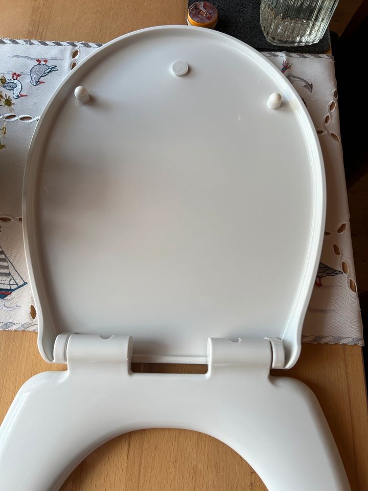 Toiletten Sitz mit Kindereinsatz in Moormerland