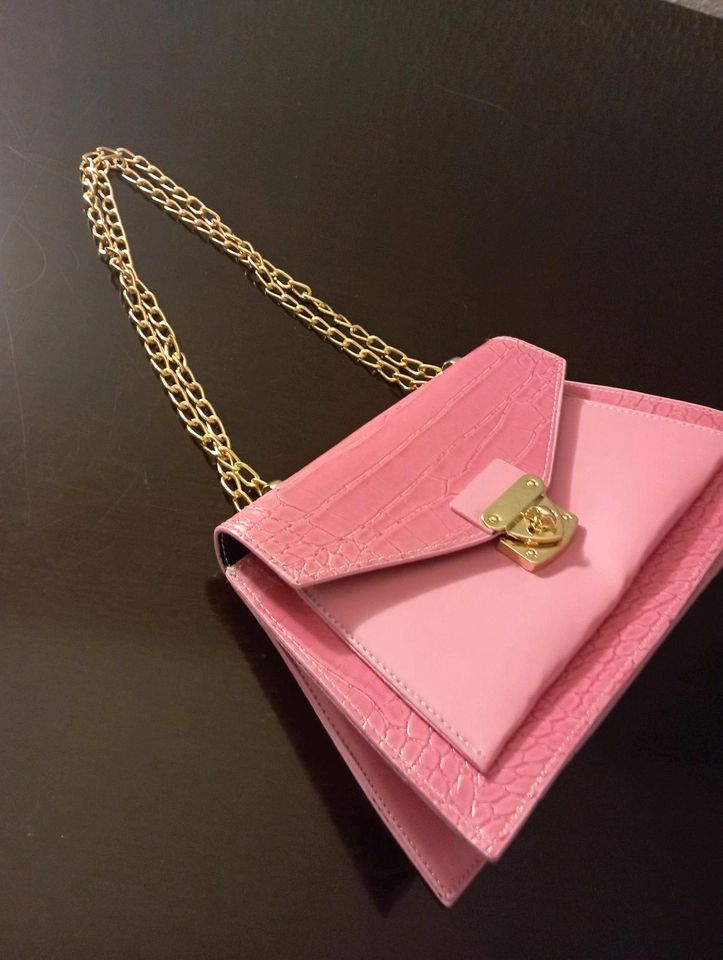 Handtasche pink- gold in Bielefeld