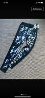 Superschöne Leggins in Schwarz / Blumenprint von Roxy, Gr. XS NEU Nordrhein-Westfalen - Bedburg Vorschau