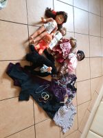 Puppen und Kleidung zu verschenken Niedersachsen - Großefehn Vorschau