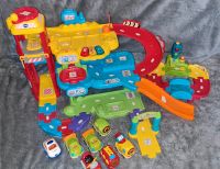 Vtech tut tut baby Flitzer set/ Parkhaus+Rennstecke + 7 Autos Bayern - Sonthofen Vorschau