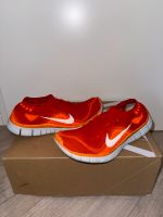 Nike Free 5.0 Laufschuhen orange / weiß Gr. 42,5 / 8 Niedersachsen - Lastrup Vorschau