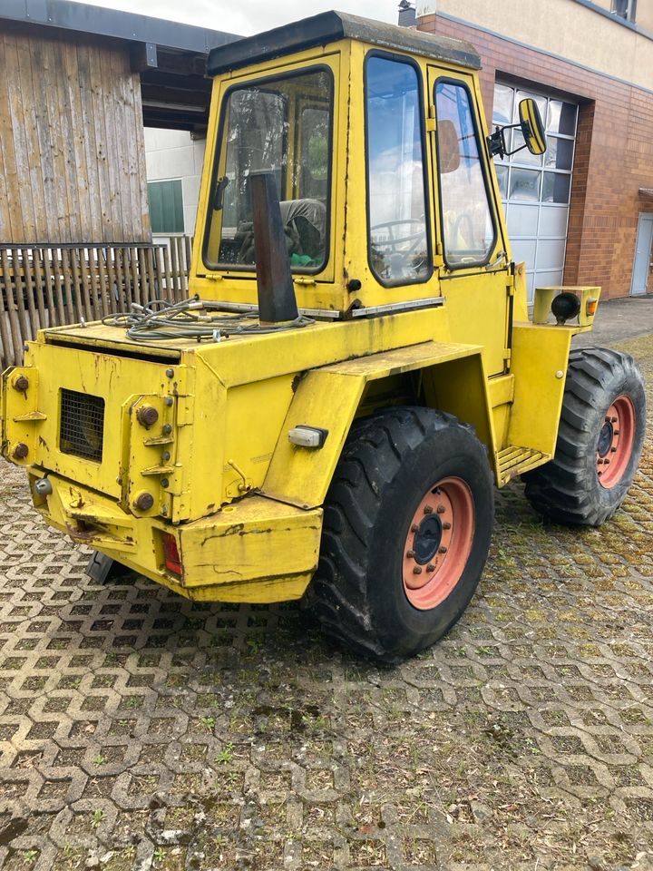 Kramer 412 Radlader mit Schaufel, Schneeschild, Gabeln in Bitburg