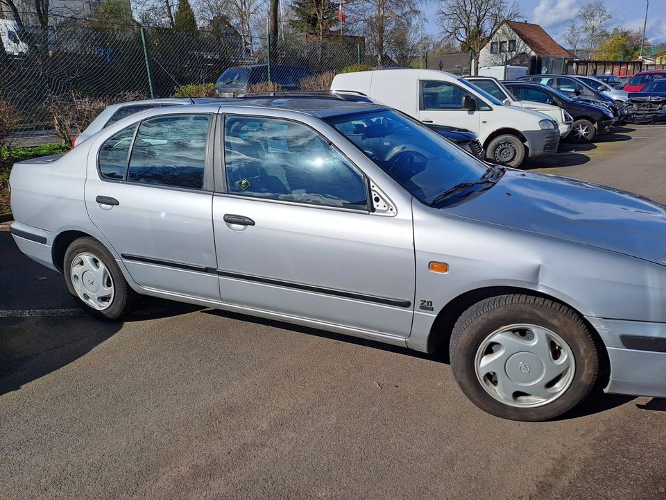 Nissan Primera SLX "Schlachtfest" 1974ccm 66kW 90PS 7/1997 in Neuhof