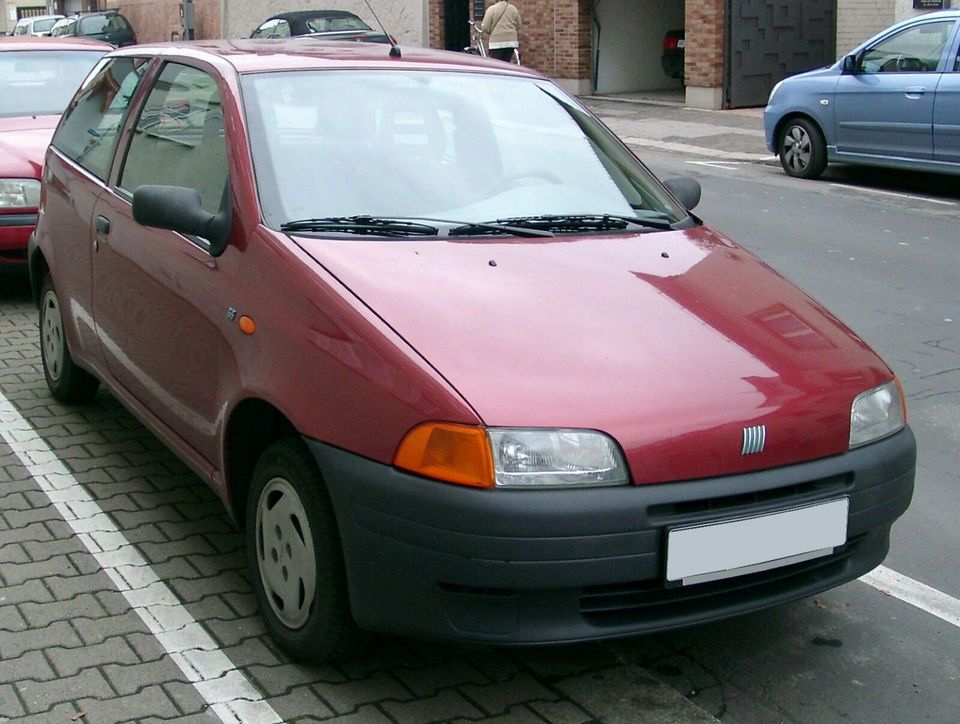 Seitenblinker für Fiat Punto 176 orange links/rechts mit Lampe in Osnabrück