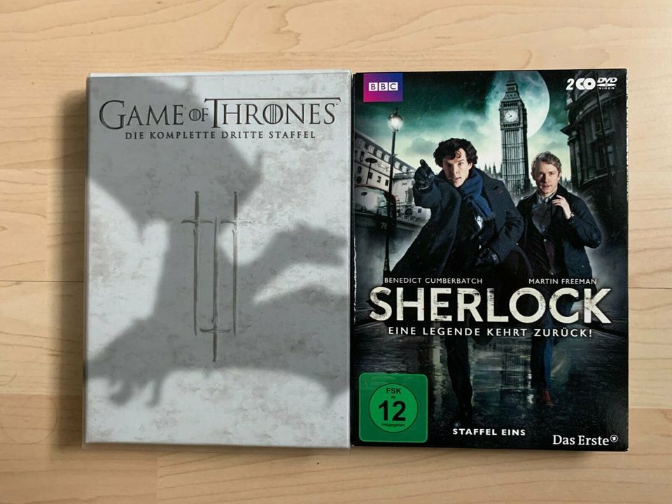 Sherlock (Staffel 1) + Game of Thrones (Staffel 3) DVD in Hasselroth