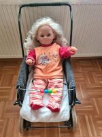 Puppe mit Retro Puppenwagen, Kleidung und Windeln Niedersachsen - Ostercappeln Vorschau