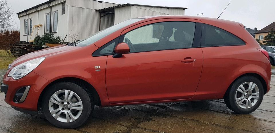 Opel Corsa D 1.4 Satellite Benzin 42.251km 3-tür. Orange Metallic in Zeulenroda