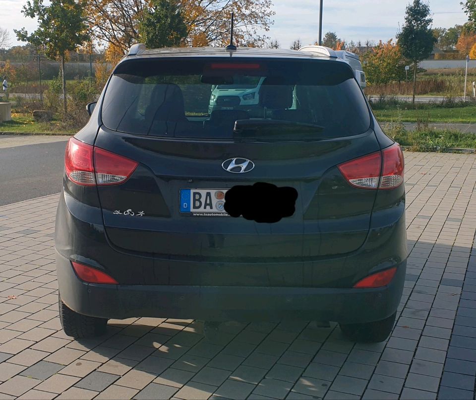 Hyundai ix35 Tucson Klima AHK Alufelgen Leder schwarz Benzin TÜV in Memmelsdorf