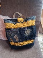 Häkel-Tasche DIY schwarz-gelb Hessen - Nidda Vorschau