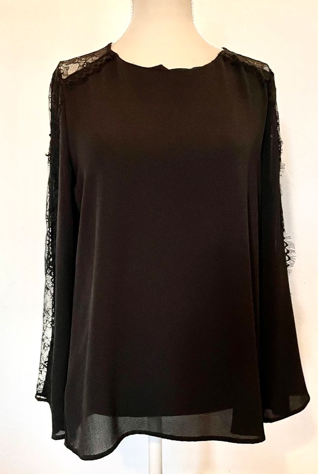 Schwarze Bluse mit spitzeneinsatz in den Ärmeln in Dresden