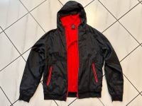 Regenjacke/Übergangsjacke Urban Classics Größe L schwarz/rot Baden-Württemberg - Laudenbach Vorschau