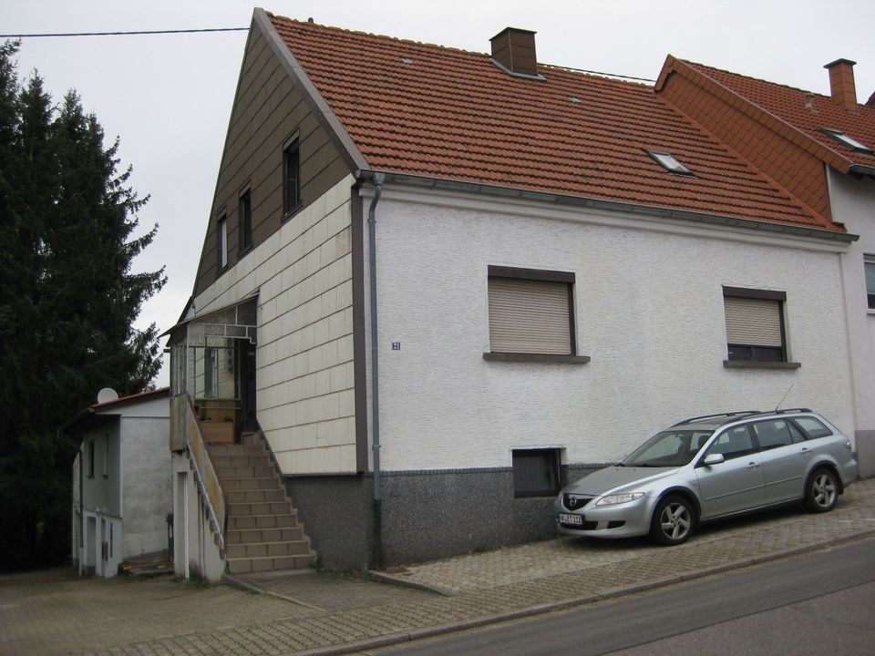 2 Wohnhäuser und ein Bauplatz in Hüttigweiler,gesamt ca 2000qm in St. Wendel