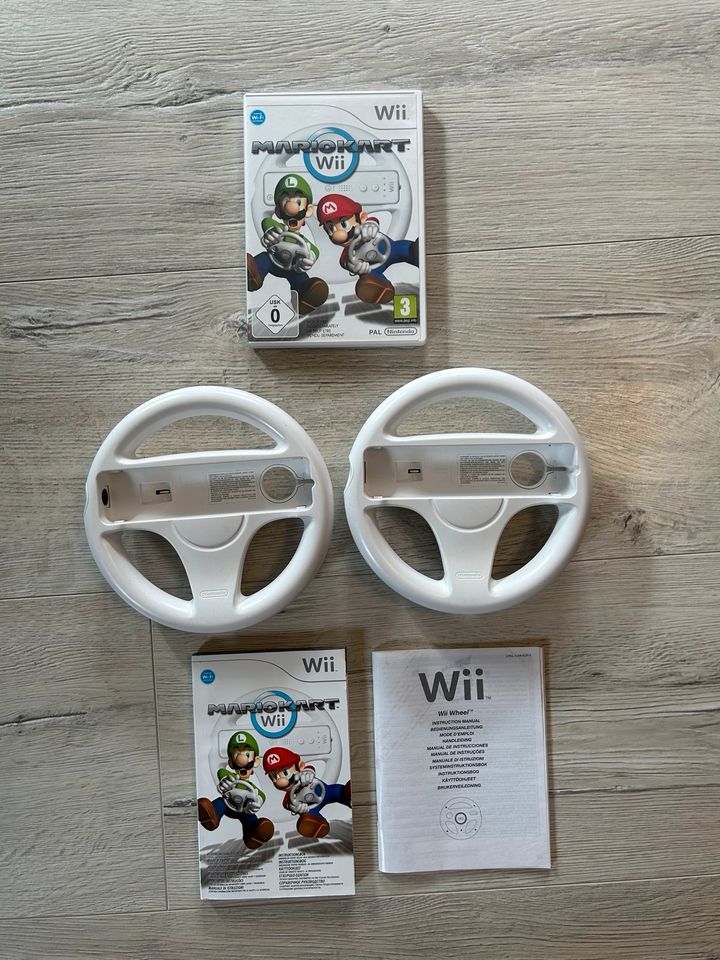 Nintendo Wii + 12 Spiele, Balance Board, Mario Kart, We Sing usw. in Kaltennordheim