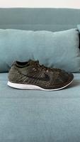 NIKE Flyknit Racer Rough Green (Größe 43) Hessen - Geisenheim Vorschau