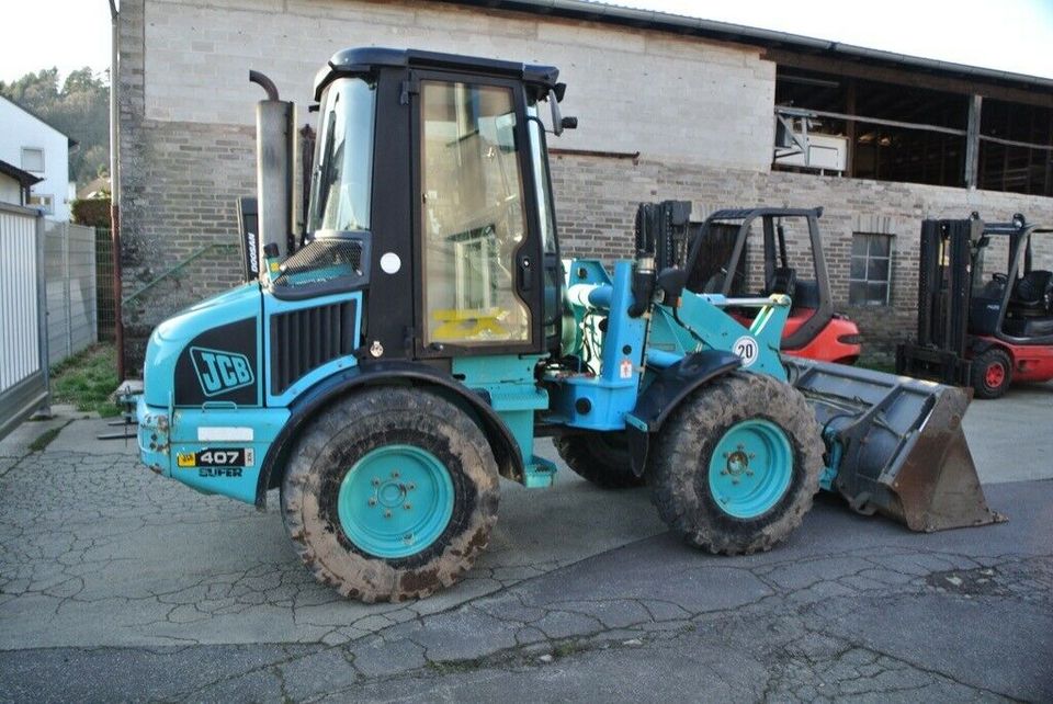 Radlader JCB 407 ZX Super Schnellwechsler Schaufel Palettengabel in Trassem